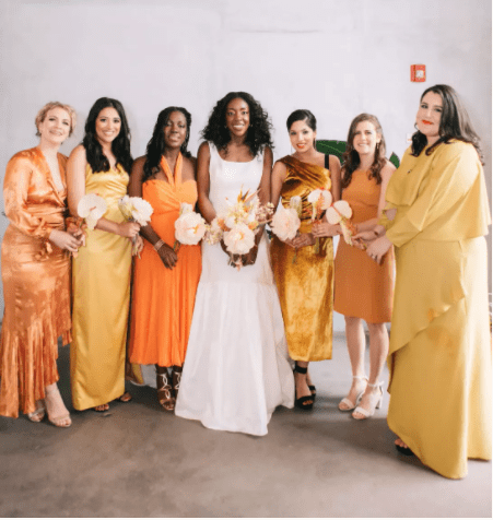Bride and bridesmaids in different dresses